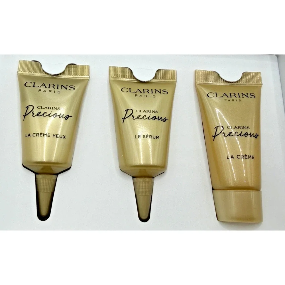 Clarins Precious Mini Skin Care Set Eye, Serum, Moisturizer Caffeine Hydrating